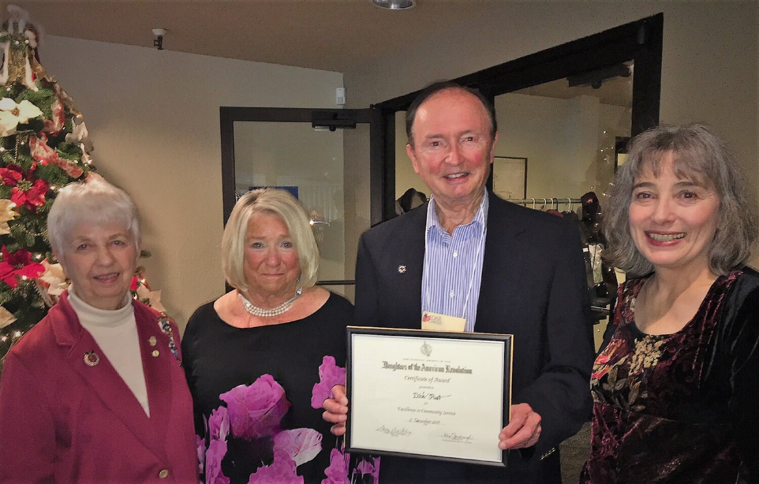 Dick Pust has received hundreds of awards and “thank you” letters for his contribution at the station and throughout the community, including special recognition from the Congress of the United States. In 2017, Della Stenstrom and I had the pleasure of awarding Dick with the Community Service Award, issued by the Sacajawea Chapter Daughters of the American Revolution. Pictured: Della Stenstrom, Dick’s wife Pam Pust, Dick Pust, and Shirley Stirling.